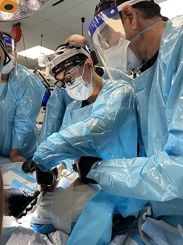 Image of Dr. Nguyen in surgery.