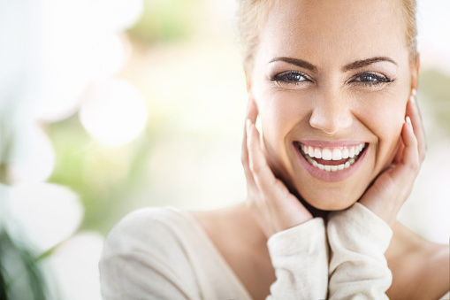 Smiling female patient of Surprise Oral & Implant Surgery in Surprise, AZ